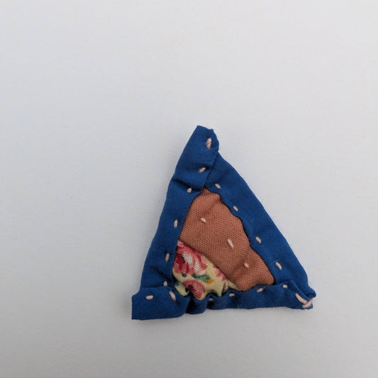 Triangle patchwork magnet with pink and blue